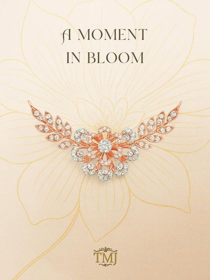 A moment in bloom. This beautiful brooch, which can also be worn as a pendant, features a floral design crafted from rose gold and brilliant diamonds.