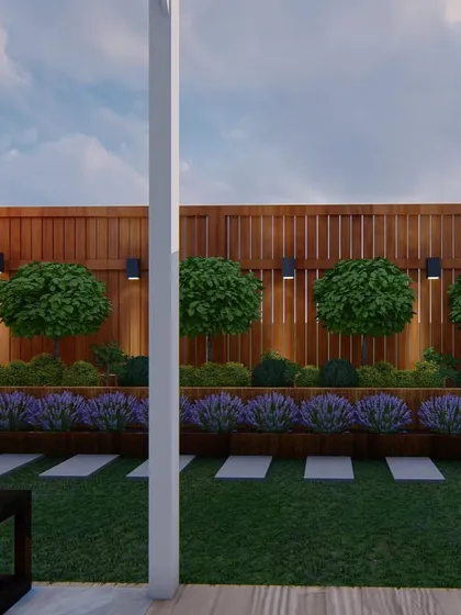 A design view showing the layered planting we planned along the fence. Using plants of different heights and shapes creates a lush, full look and a beautiful backdrop for family playtime.