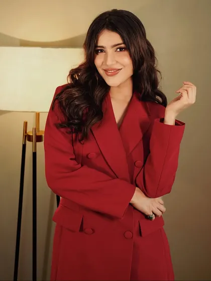 The complete look, showing how the hair, makeup, and styling come together for a polished result.