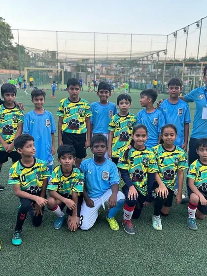 Our U-10 team posing with the opposition before a match in the MCFC Grassroots League. We teach our players sportsmanship and respect for their opponents.