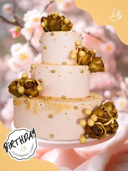 A grand three-tier cake in soft pink, adorned with golden roses and pearls. This luxurious and elegant design is perfect for a milestone birthday or wedding.