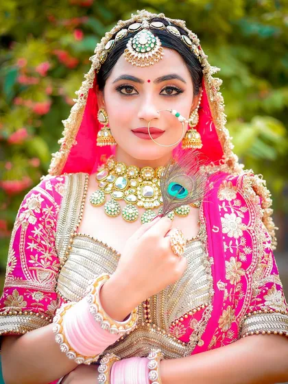 An outdoor bridal portrait using natural light. The soft background and focus on the subject's expression create a timeless and elegant feel.