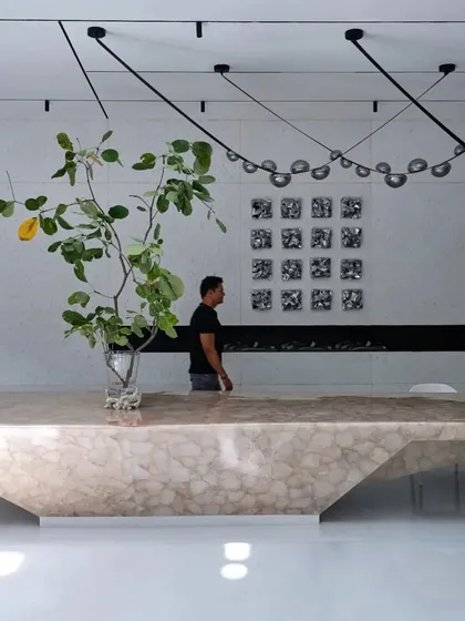 A detail of the 'Vrinda' project's dining area, featuring a stunning table made of translucent stone. This project was a celebration of innovation, aesthetics, and artful design.
