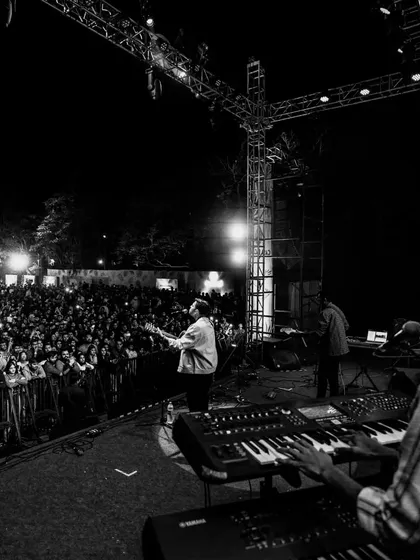 A black and white shot of the band and the incredible Jaipur crowd. The energy was electric that night. This is the connection we strive for at every show.