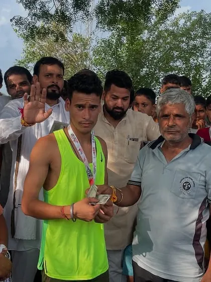 Celebrating a young athlete's victory at a local run. Seeing the joy and pride in their eyes is my biggest reward.