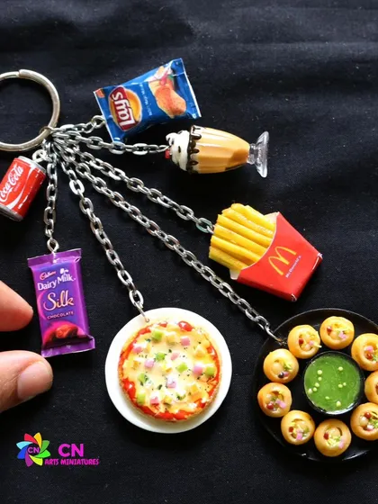 This assorted keychain shows how you can turn your favorite foods into wearable art. In my classes, you'll learn to make tiny pizzas, pani puri, chocolates, and more that you can carry with you everywhere.