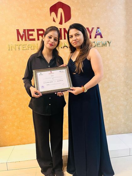 Dressed in professional black, this graduate is ready to step into her new career.