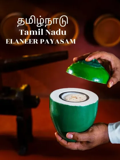 A unique presentation of Elaneer Payasam (tender coconut kheer) served inside a painted coconut shell. This creative shot from a Tamil Nadu menu highlights tradition with a modern, artistic twist.