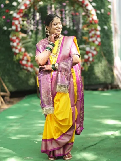 A joyful, candid moment captured. Her smile says it all. The makeup is designed to withstand happy tears and endless smiles, keeping her looking fresh and radiant throughout the celebration.