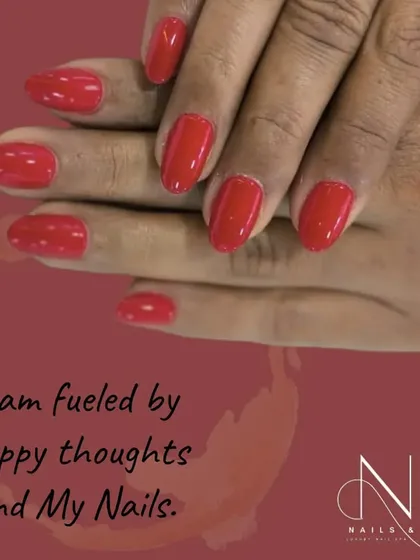 A simple, solid red manicure is always a good idea. This look is clean, classic, and effortlessly chic.