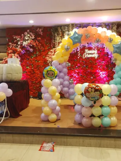 Another angle of the Cocomelon naming ceremony stage decoration.