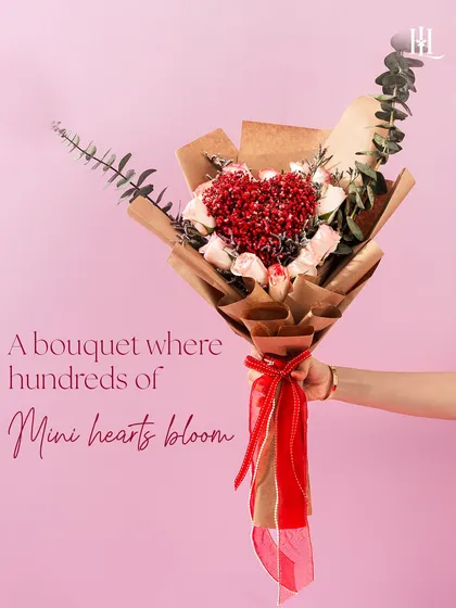 Another view of the mini heart bouquet, a perfect blend of romance and elegance. The rustic paper and red ribbon complete this heartfelt Valentine's gesture.