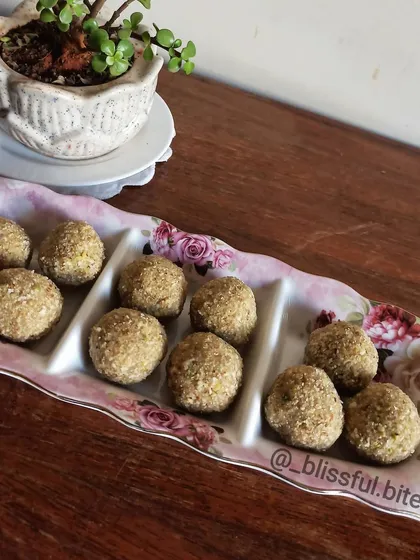 My Goandh Ke Laddu, elegantly served on a floral platter. Each laddu is a bite of wholesome goodness, perfect as an energy snack.