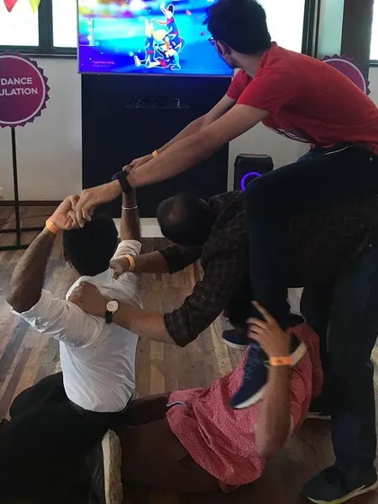 While a VR dance simulation plays on screen, employees engage in a fun physical team-building activity. My events are designed to bring people together, both in and out of the headset.