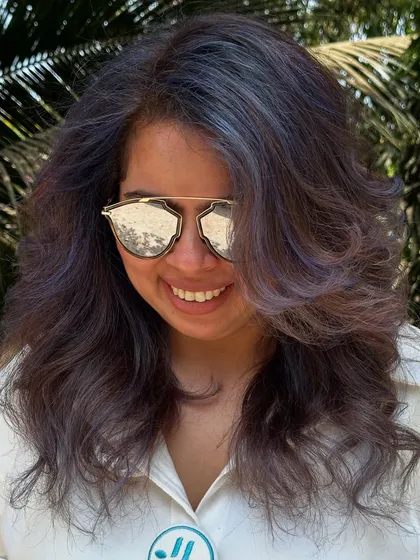 For my experimental clients like Bhakti, we love to play. This time we went for a cool purple and blue mix on her curly hair. The color looks so different after a few washes, fading into a beautiful pastel tone.