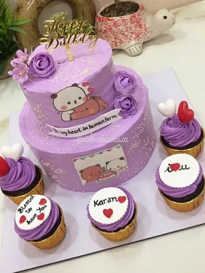 A super cute Bubu-Dudu themed cake ordered by a bride for her groom's birthday, which was also their wedding day. This two-tier lavender cake was accompanied by five matching cupcakes with personalized messages.