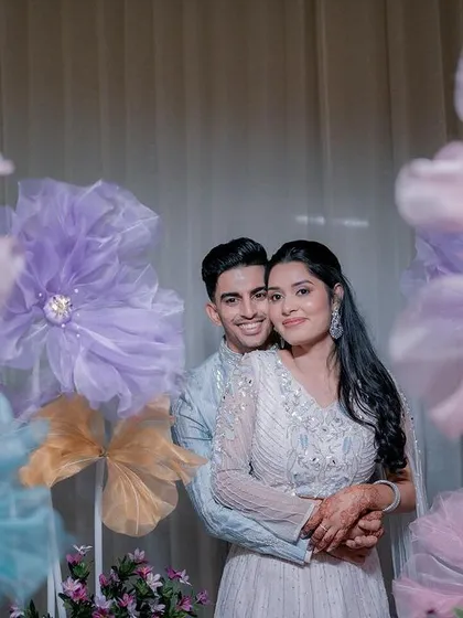 A candid, happy moment from Yash and Sakshi's engagement celebration. Our goal is to create events where couples feel completely at ease and joyful.