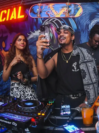A fan taking a selfie from the DJ booth. We love our fam.