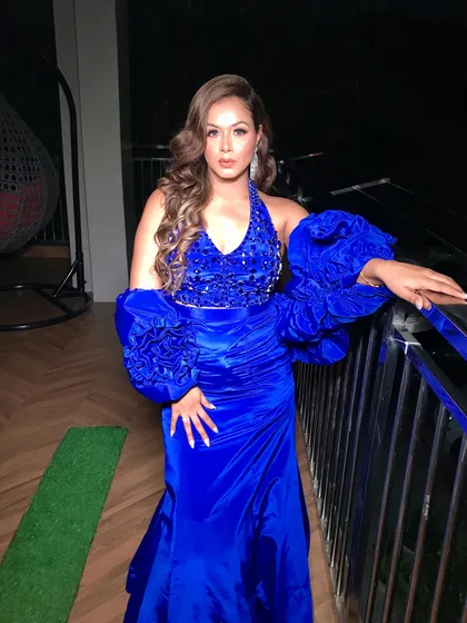 Feeling the blues in the best way possible with this dramatic blue gown for a cocktail event.