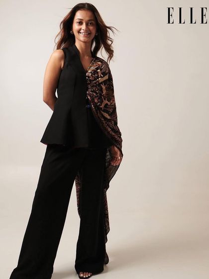 A feature in ELLE India magazine. I created a chic and sophisticated makeup look for this shot, focusing on clean lines and a polished finish.