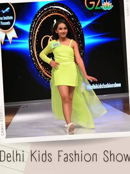 This young fashionista rocks a modern, asymmetrical neon green dress. Her confident pose and smile show she's having a great time in the spotlight.