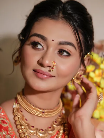 This angle highlights the delicate nath and the soft contouring on the cheeks.