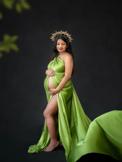 In my studio, you can be whoever you want to be. Here, we went for a regal, powerful look with a vibrant green drape and a golden crown, celebrating the queen that you are.