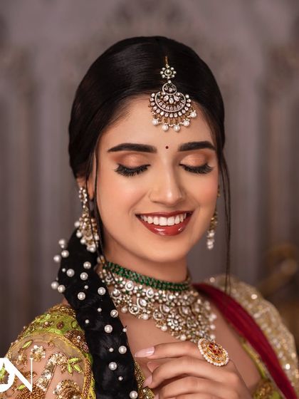 A close-up to show the soft, glossy lips and the clean, defined eye makeup of this non-bridal portfolio look.