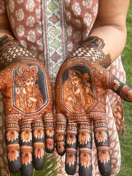 For brides who want a divine touch, I create portraits of Radha and Krishna. This design features the divine couple on the palms, surrounded by delicate lotus and traditional patterns, using negative space to make the figures pop.