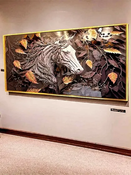 This dramatic 24x36 inch crystal painting captures the raw power and beauty of a horse. The intricate details of the mane and the surrounding autumn leaves create a dynamic and captivating piece of art.