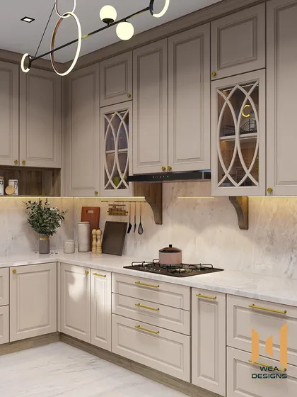 A wider view of the neoclassical kitchen, highlighting the modern circular lighting fixture that contrasts beautifully with the classic cabinetry.