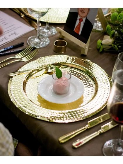 A raspberry and mint sorbet is served as a palate cleanser during a multi course dinner. This small but crucial detail shows our commitment to the classical structure of a fine dining experience, ensuring each course is enjoyed to the fullest.