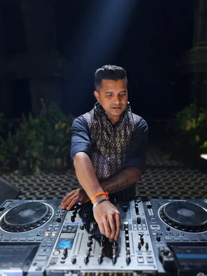 A close-up of me at my Pioneer DJ console. I use industry-standard equipment to ensure the highest quality sound and a professional performance.