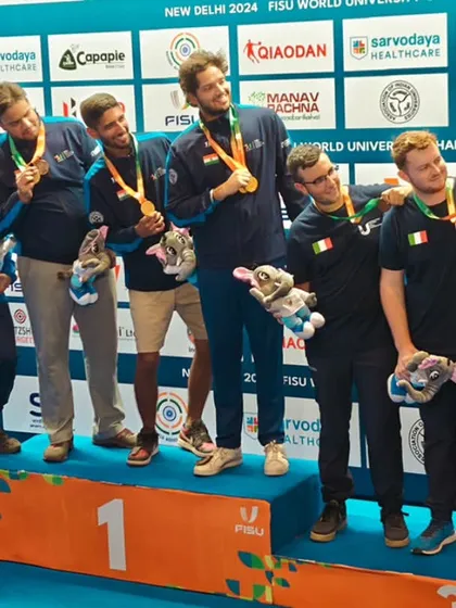 A moment of fun on the podium. The winning teams of the Skeet Men event capture their victory with a selfie, showcasing the joy and camaraderie our events foster.