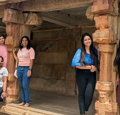 Exploring the ancient pillars of a temple during our Adiyogi trip. The architecture is as captivating as the spiritual significance.