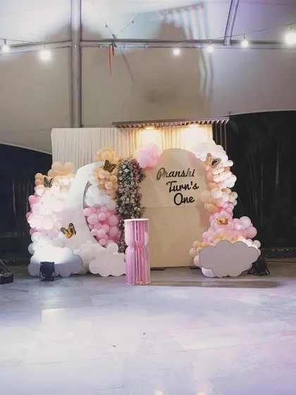 The full stage view for Pranshi's first birthday, showing the scale of the setup in a large tented venue, ready for a big celebration.