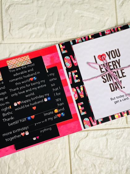 This page from a flipbook for a husband includes space for a long, heartfelt message and a tied-up card for an extra personal touch.