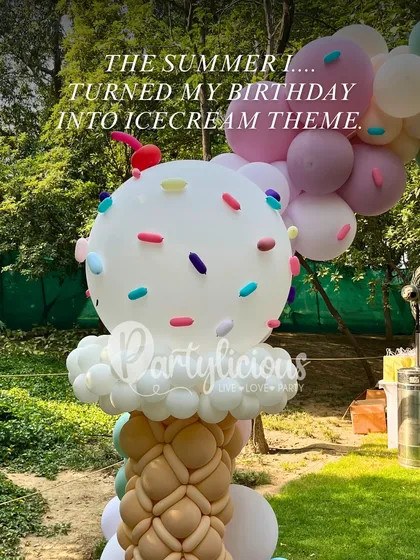 "The summer I turned my birthday into an ice cream theme." This giant balloon ice cream sculpture with a sprinkle-topped scoop is a fantastic statement piece for any outdoor summer party.