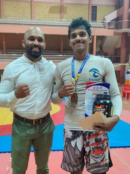 Receiving my gold medal, cash prize, and supplements from the event organizers and sponsors in Kerala. It's great to see the sport growing and getting support.