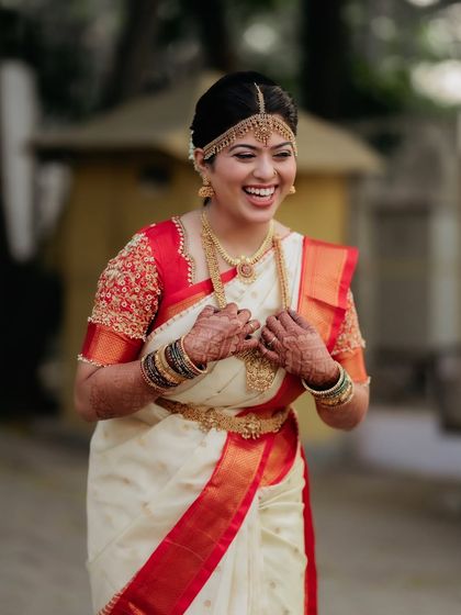Laughter and joy are the best accessories. I ensure my bridal makeup is waterproof and smudge-proof, so it holds up through all the happy tears and smiles.