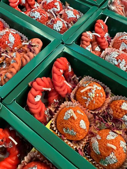 A closer look at the detail in my laddoo and imarti candle boxes. The vibrant colors and realistic textures make them a festive dream, perfect for weddings and traditional gifts.