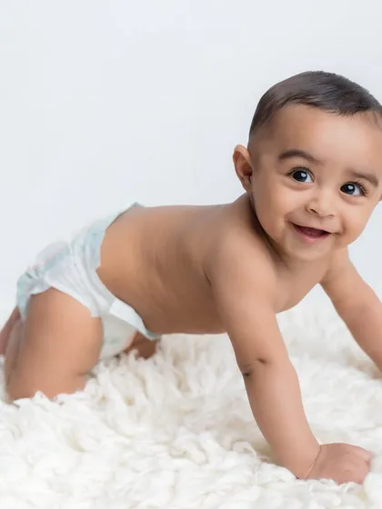 The classic crawling pose, full of excitement and energy.