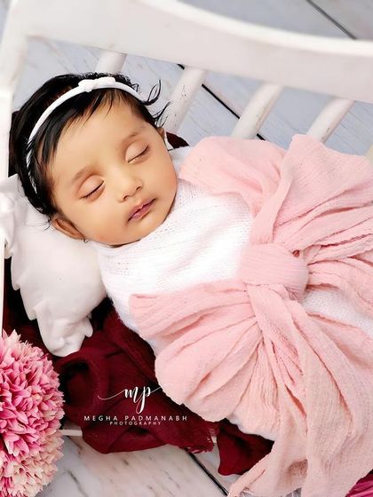 A lovely angled shot that highlights the baby's peaceful sleep.