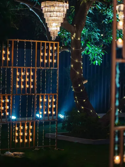 A closer look at the candle wall installation, where hundreds of candles create a mesmerizing wall of flickering light.