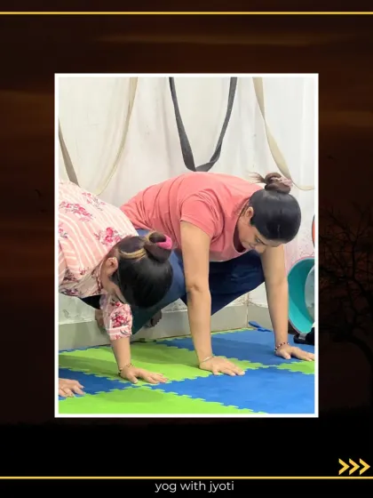 A partner-assisted Crow Pose, where one student helps the other find the correct alignment and lift.