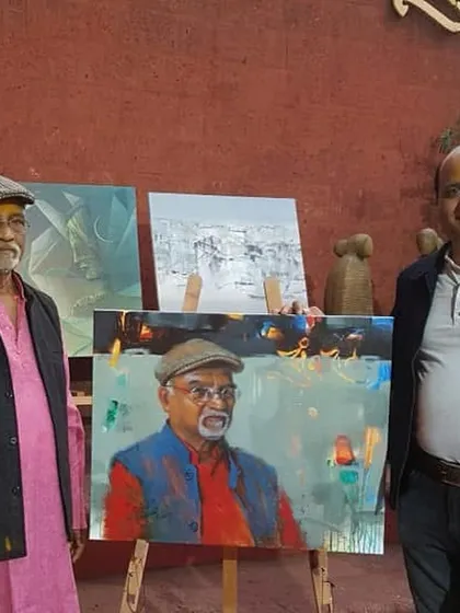 A cherished memory standing with the respected Raosaheb Gurav Sir and my portrait of him.
