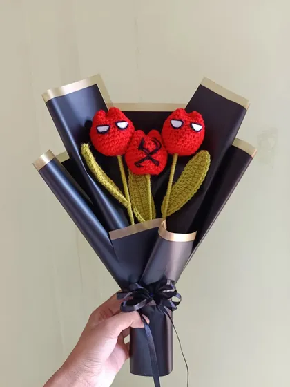 A bouquet of three Spiderman tulips, a great gift for a superhero fan.