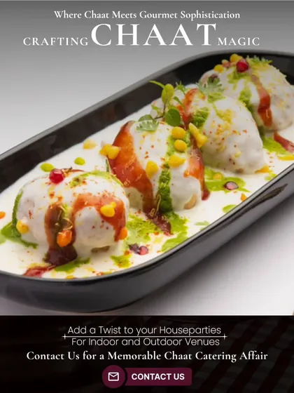 Crafting chaat magic where street food meets gourmet sophistication. This beautifully plated Dahi Bhalla, garnished with pomegranate seeds and chutneys, is perfect for adding a twist to your house parties.