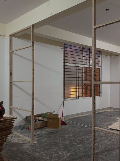 Before the layers of texture and color, there was a simple wooden skeleton. This image shows the initial framework we built to divide the long, narrow space, creating the intimate zones that would later each get their own unique personality.