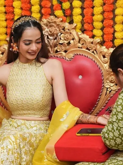 A behind-the-scenes moment, capturing me in my element as I apply mehendi for the lovely bride-to-be, Anusshka.